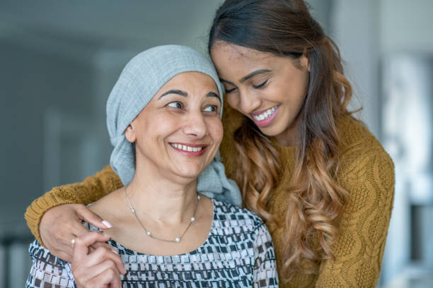 istock Cancer Patient Sitting Outside with Her Daughter 1362003611