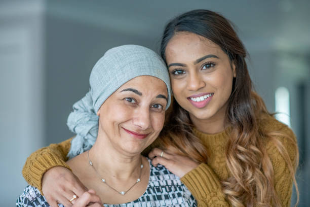 istock Cancer Patient Sitting Outside with Her Daughter 1362003612