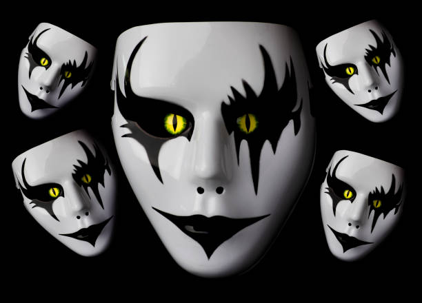 istock Masquerade face mask scary mask for Halloween with hand made monster eyes hand sprayed by photographer with dramatic lighting black and autumn leaf background 1362006458