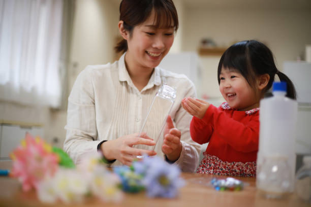 istock Parents and children who make herbarium by hand 1362008663