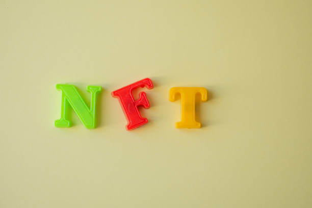 istock NFT words isolated against yellow background 1362011903