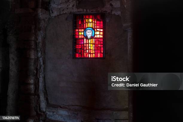 An Medieval Stained Glass Showing The Face Of The Christ Stock Photo - Download Image Now