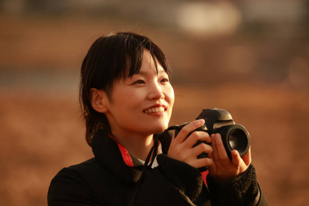 istock Woman taking a picture 1362018173