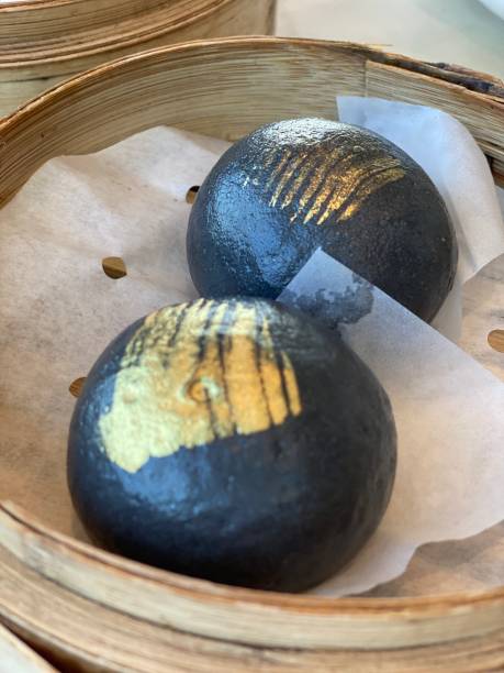 Dim Sum steamed creamy custard bun with gold leaf