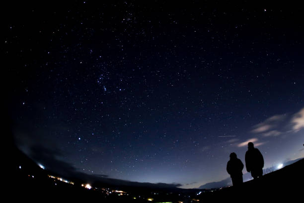 istock Couple looking at the starry sky 1362018297