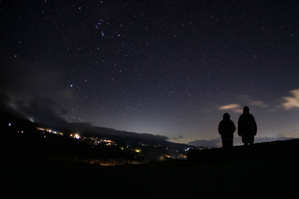 istock Couple looking at the starry sky 1362018304