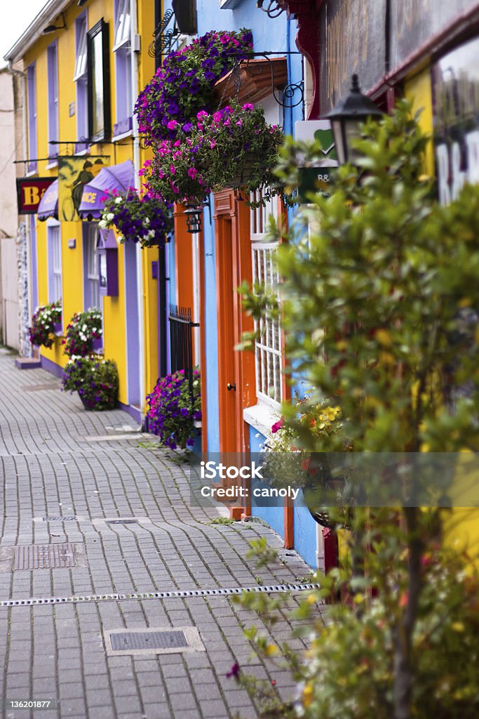 Row of colorful building fronts seen from the street Colorful street in Kinsale, county Cork, Ireland Kinsale Harbour Stock Photo