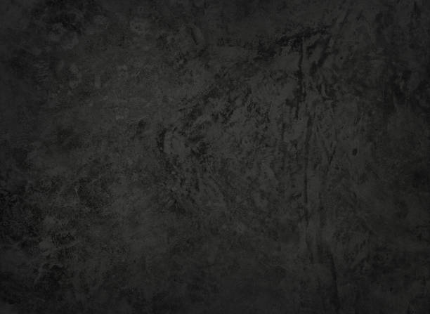 istock dark black dirty plaster concrete wall texture used as background. old grungy texture, grey concrete flooring background. texture of dark gray decorative stucco or cement. 1362021176