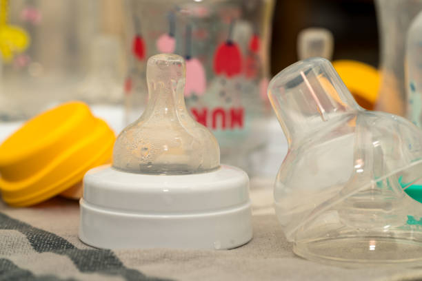 istock Baby teat bottle parts 1362022543