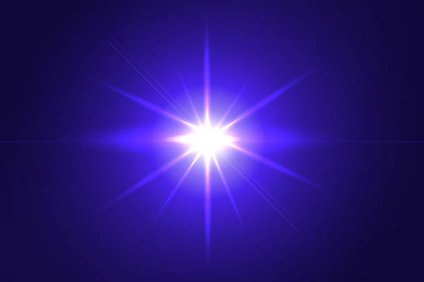 istock Len flare effect on  a dark purple background 1362026539