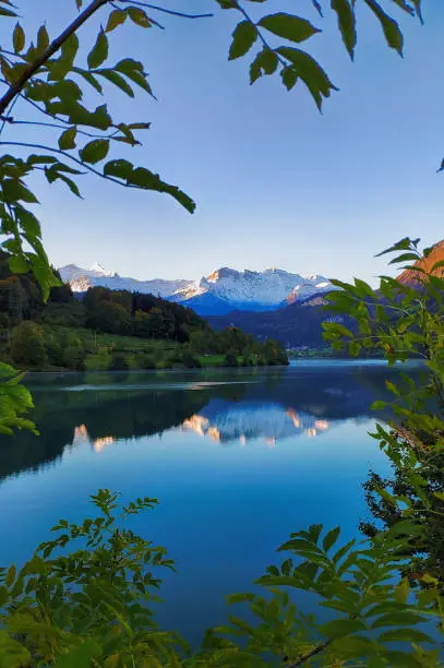 Beautiful valley and village of Lake Lungern or Lungerersee in Obwalden, swiss village Lungern in Switzerland