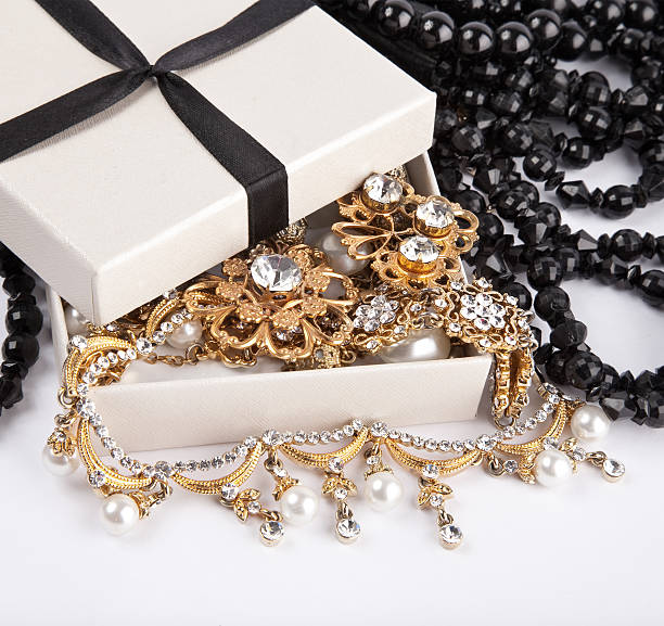 istock Golden jewelry in open box 136203651