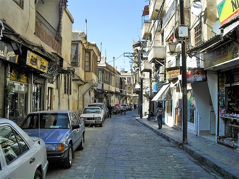 Narrow street in the Old City of Damascus, Syria on a quiet Monday afternoon.  This image was taken on a sunny day in Spring.