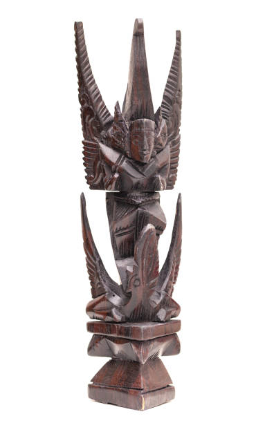 istock Wooden figurine, totem statue isolated in white backround 1362041072