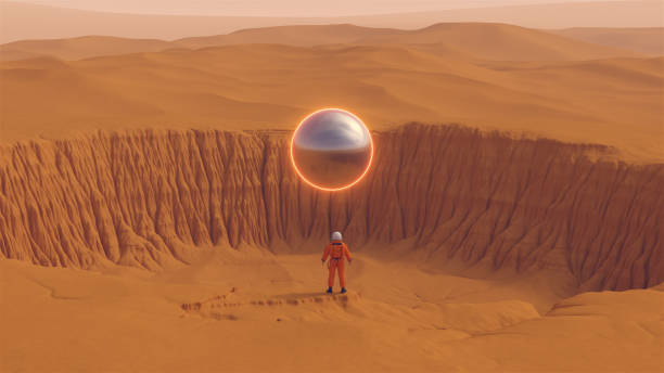 istock Orange Spaceman Spacewoman With Large Alien Silver Sphere Glowing Orange Crater Desert Sand Dune Sci Fi Astronaut Cosmonaut Landscape 1362044462