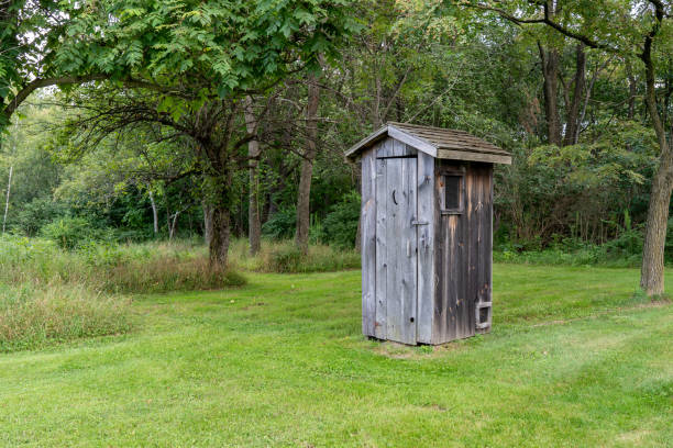 istock Outhouse on Green Lawn 1362054993