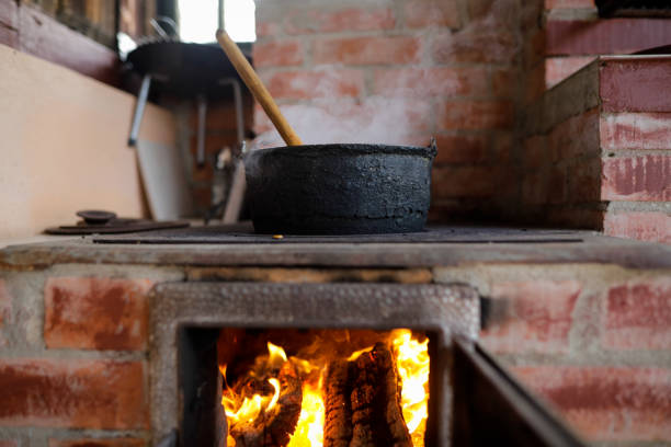 a dirty saucepan stands on a dirty gas stove in the kitchen at home, cooking soup on the stove, gas stove, kitchen