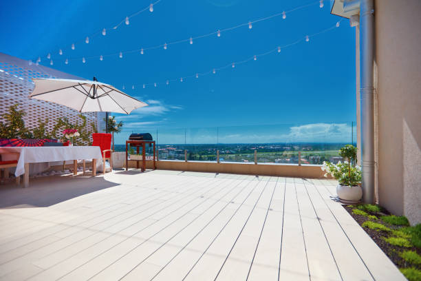 istock furnished patio zone, rooftop terrace at warm summer day 1362064391
