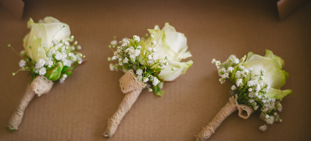 Three Bridegroom's floral decorations on the table