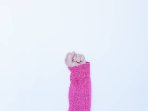 istock Woman fist on white background 1362072183