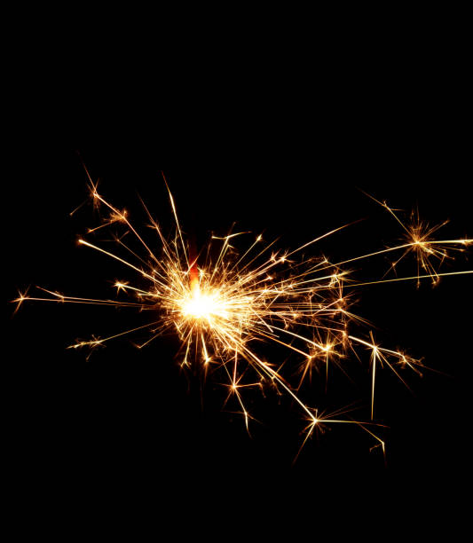 istock Christmas sparkler Isolated On Black. Fuse Burning 1362073242
