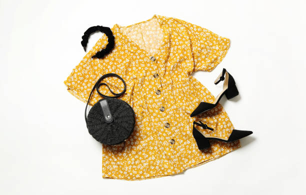 istock Flat lay composition with stylish yellow dress on white background 1362075098