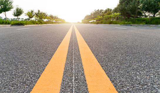 Double yellow line in the middle of the road.