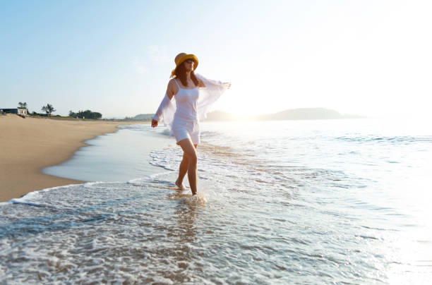 istock Young woman stepping on the waves 1362076334