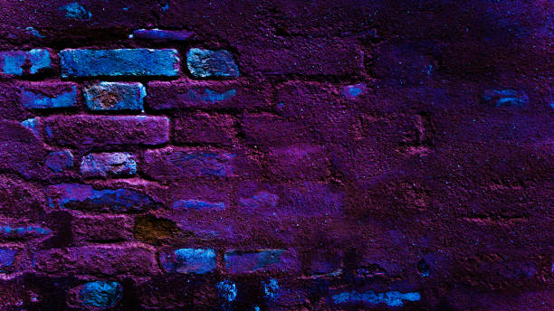 istock Neon wall. Dark blue night light background. Abstract bar brick neon texture. Lighting effect pink and blue on empty brick wall. 1362079759