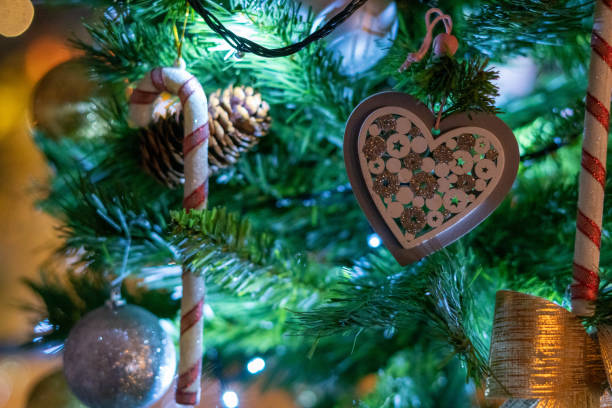 istock Multiple Christmas decoration hanging on the fir tree 1362081939