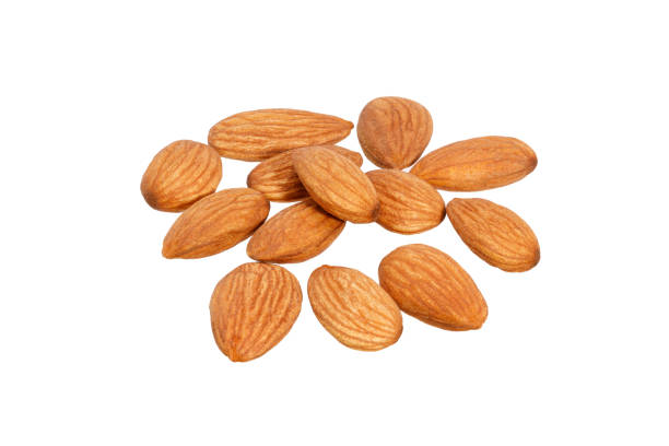 istock heap of almonds isolated on white background 1362083655