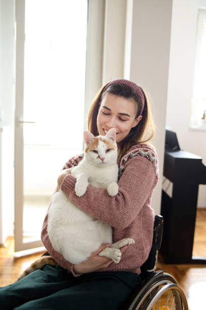 istock Disabled woman with her cat 1362084500