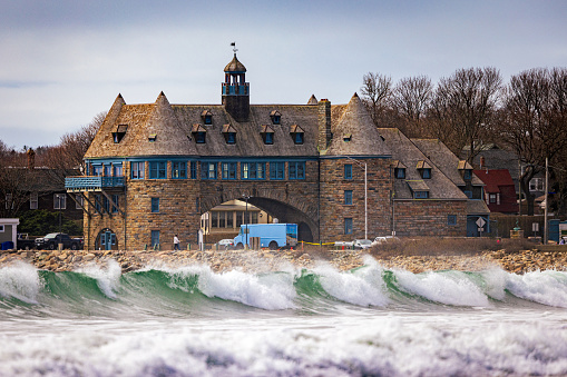 A shot of the Narragansett Towers, with crashing waves in the foreground.  Narragansett, RI.