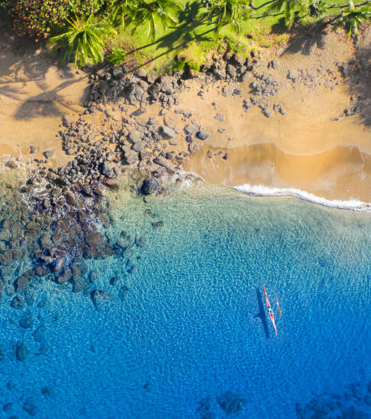 Kayaking in the blue ocean stock photo