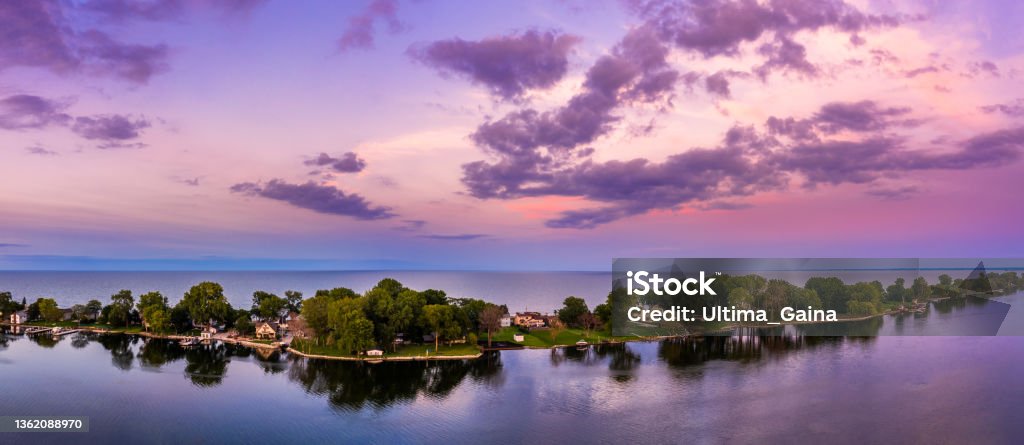 Aerial panorama of the Ceder Point peninsula at dusk Aerial panorama of the Ceder Point peninsula at dusk, in Sandusky, Ohio, on the Erie lake. Lake Erie Stock Photo