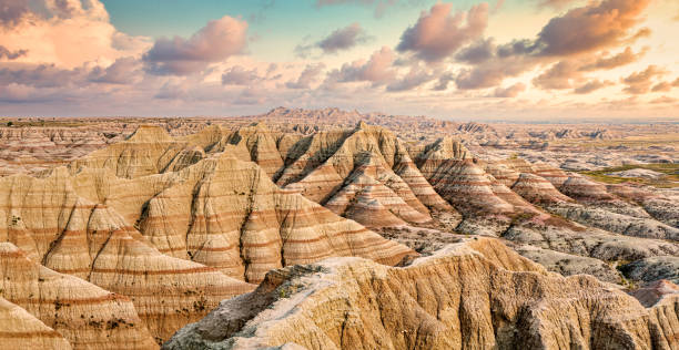 Badlands National Park panorama in South Dakota Badlands National Park panorama in South Dakota. Badlands protects sharply eroded buttes and pinnacles, along with the largest undisturbed mixed grass prairie in the United States. barron gorge national park stock pictures, royalty-free photos & images