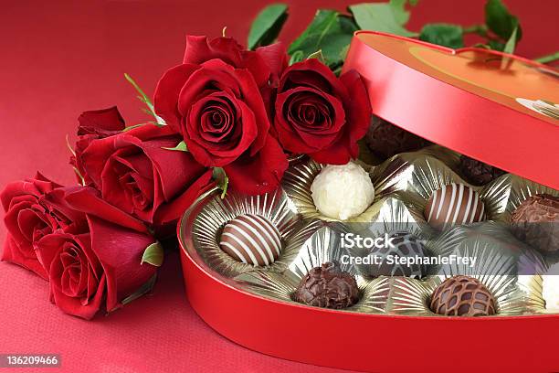 Red Heart Shaped Box Of Chocolates And Red Roses Stock Photo - Download Image Now - Candy, Chocolate, Chocolate Truffle