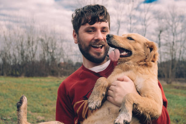 istock Man And Dog Enjoying  In Nature 1362096788