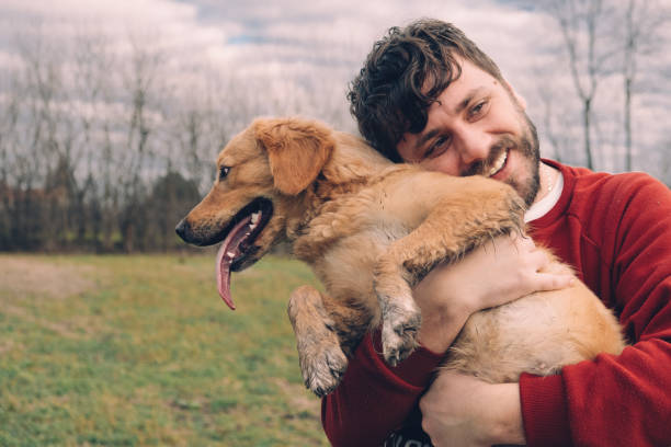istock Man And Dog Enjoying  In Nature 1362097519