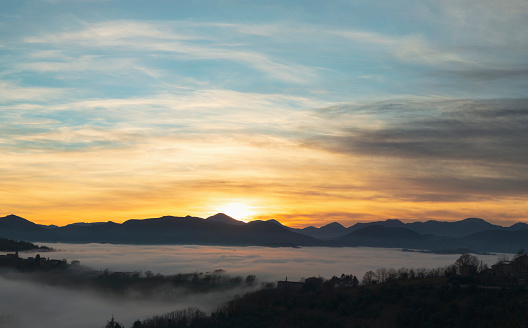 Scenic view at dusk, fog in the valley