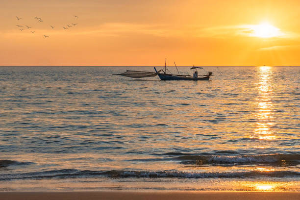 istock Sunset in Khao Lak at beach and clouds 1362099265