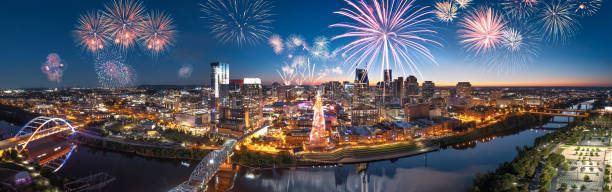 istock Nashville Skyline by river front with fireworks 1362107411