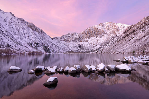 Mountain Lake Sunrise with Snow stock photo