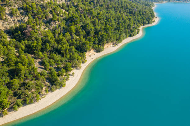 The mountains on the shores of Lake Sainte-Croix in Europe, in France, Provence Alpes Cote d'Azur, in the Var, in summer, on a sunny day. stock photo