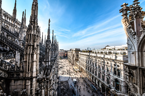 Milan, Italy - February 24, 2024: View of Piazza del Duomo with the Galleria Vittorio Emanuele II from the top of the Milan Cathedral (Duomo di Milano) in Milan, Italy