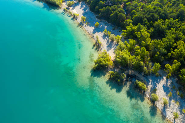 The Lake of Sainte-Croix seen from the sky in Europe, in France, Provence Alpes Cote d'Azur, in the Var, in summer, on a sunny day. stock photo