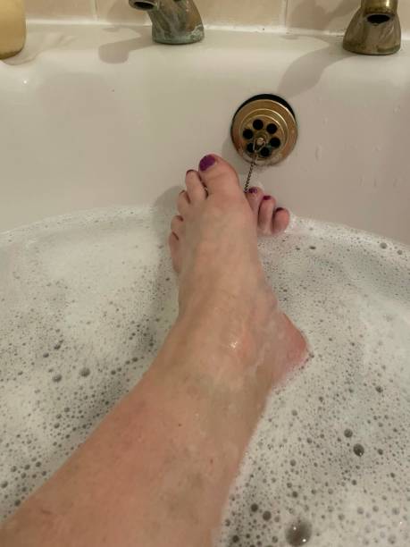 istock Feet in the bath 1362116243