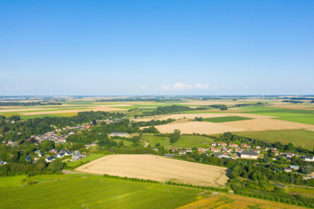The Normandy countryside with its villages and fields in Europe, France, Normandy, summer, on a sunny day. stock photo