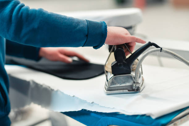 istock Clothes Ironing In Textile Factory 1362118153