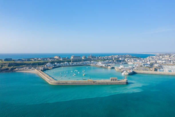 the port of the city of granville in europe, in france, in normandy, in the english channel, in spring, on a sunny day. - cherbourg imagens e fotografias de stock